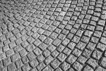 Gray cobblestone street pavement