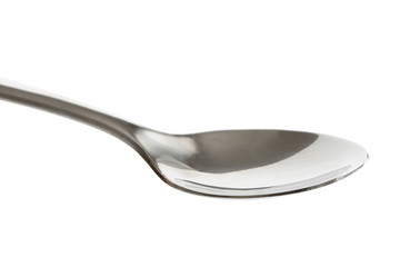 Detail of empty teaspoon isolated on white. Ready for food.