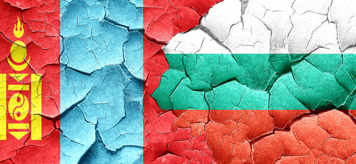 Mongolia flag with Bulgaria flag on a grunge cracked wall