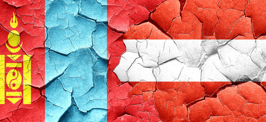 Mongolia flag with Austria flag on a grunge cracked wall