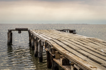 Wooden jetty leading to the sea