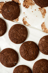 Cropped image of chocolate cookies on a baking tray
