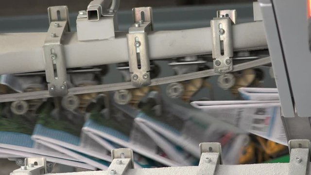 close shot of newspapers in factory industrial prinitng press