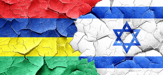 Mauritius flag with Israel flag on a grunge cracked wall