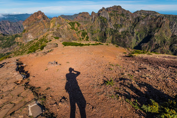 Photographer`s shadow on the mountain in Madeira