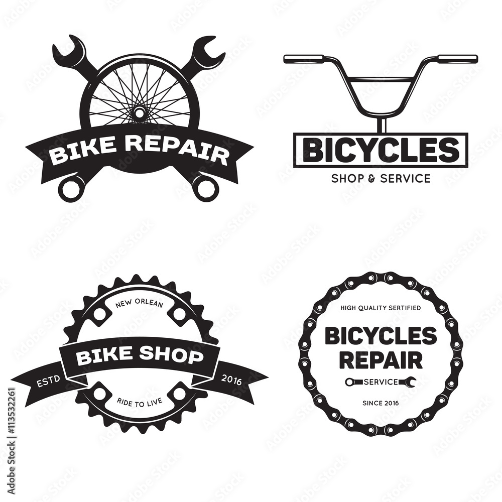 Wall mural Set of vintage and modern bike shop logo badges and labels.