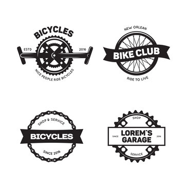 Set of vintage and modern bike shop logo badges and labels.