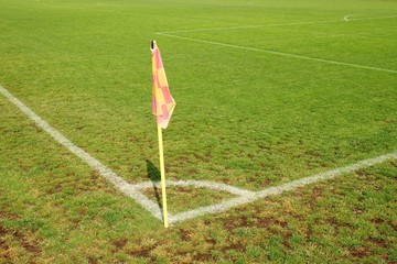 Yellow flag in corner of football playground