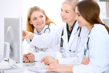 Female doctor leading a medical team at the hospital