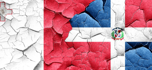 Malta flag with Dominican Republic flag on a grunge cracked wall