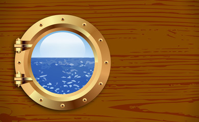 Porthole on wooden background