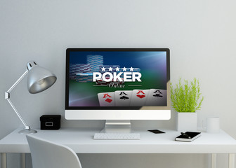 modern clean workspace with poker online website on screen
