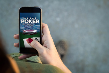 Woman walking smartphone poker online
