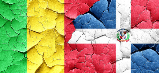 Mali flag with Dominican Republic flag on a grunge cracked wall