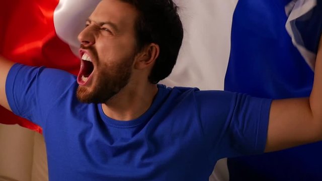 French Fan Celebrating in Slow Motion