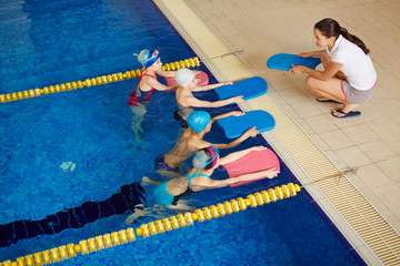 Swimmers with coach