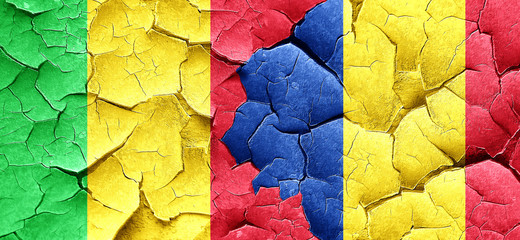 Mali flag with Romania flag on a grunge cracked wall