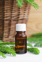 Small bottle of essential spruce (fir) oil