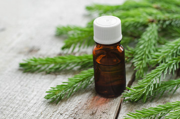 Small bottles of essential spruce (fir) oil