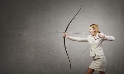 Woman aiming her goal