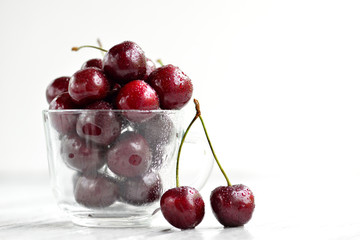 Black cherries in a cup