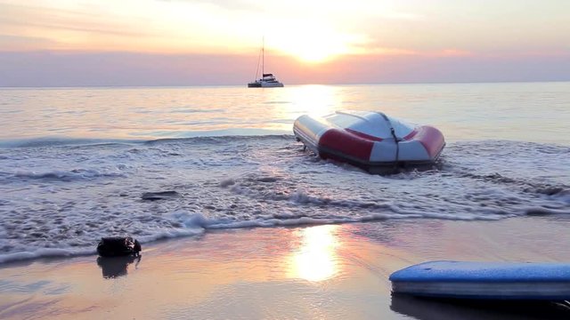 Inflatable upturned boat near the beach