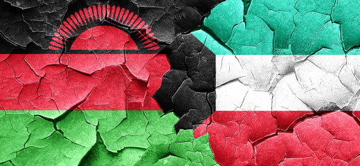 Malawi flag with Kuwait flag on a grunge cracked wall