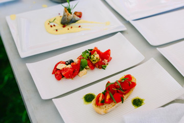 a lot of seafood cold snacks on buffet table, catering