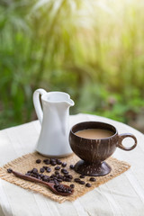 Coffee beans on the wooden floor.