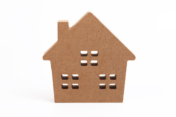 Obraz na płótnie Canvas Miniature house isolated on white background. Home ownership.