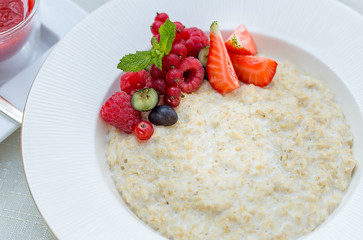 Healthy Tasty Homemade Oatmeal with Berries for Breakfast