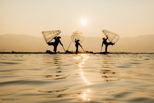 Fisherman Silhouette at Sunset, Inle lake, Myanmar , Burma