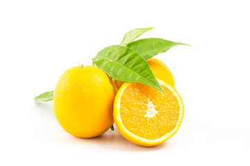 Fresh oranges isolated with leafs on white background