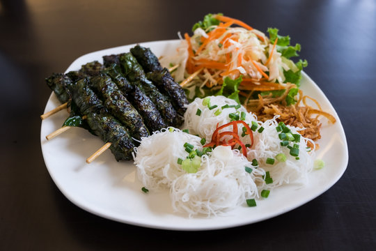 Grilled pork wrapped in betel leaf, Vietnamese cuisine
