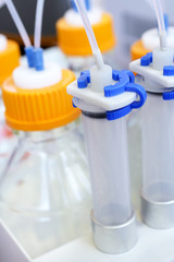 Plastic containers with members of their thin tubes.