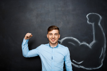 Picture of  funny man with  fake muscle arm
