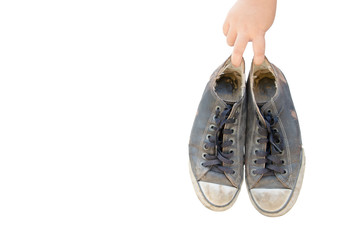 Are holding old sneakers White background