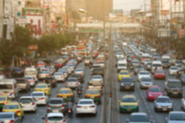 Fototapeta na wymiar blurred traffic jam with light on street in bangkok , Motion bl