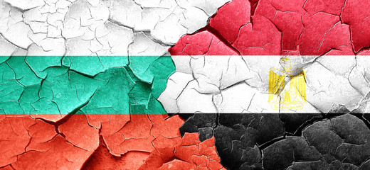 bulgaria flag with egypt flag on a grunge cracked wall
