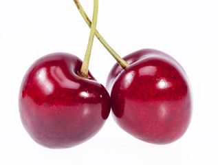 two fruits of red cherry isolated on white background