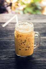 Ice coffee on the wood table
