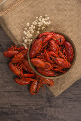 boiled big crawfish on the wooden surface