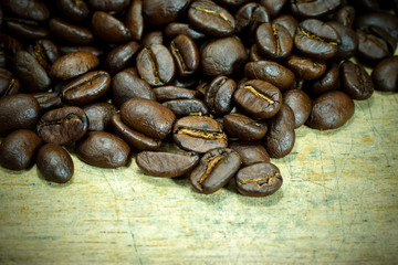 Coffee bean on wooden background