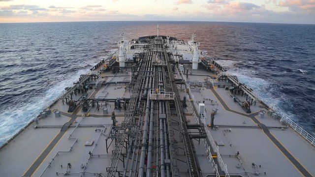 Oil tanker steaming through the ocean.