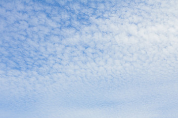 Fantastic soft white clouds against blue sky