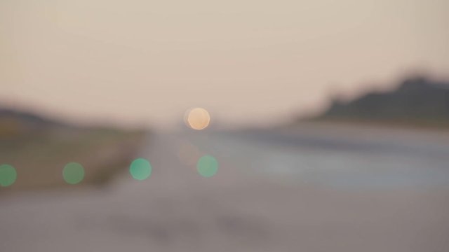 De-focused airplane flying off the runway.