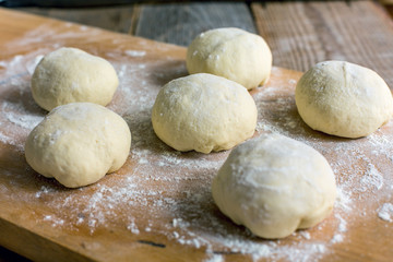 Fototapeta na wymiar Billets dough for baking buns.