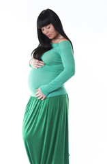 Pregnant woman in green dress