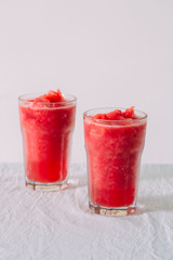 watermelon smoothie on white background.  selective focus