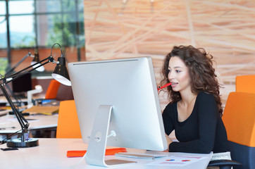 Shot of a designer at their workstation in an office